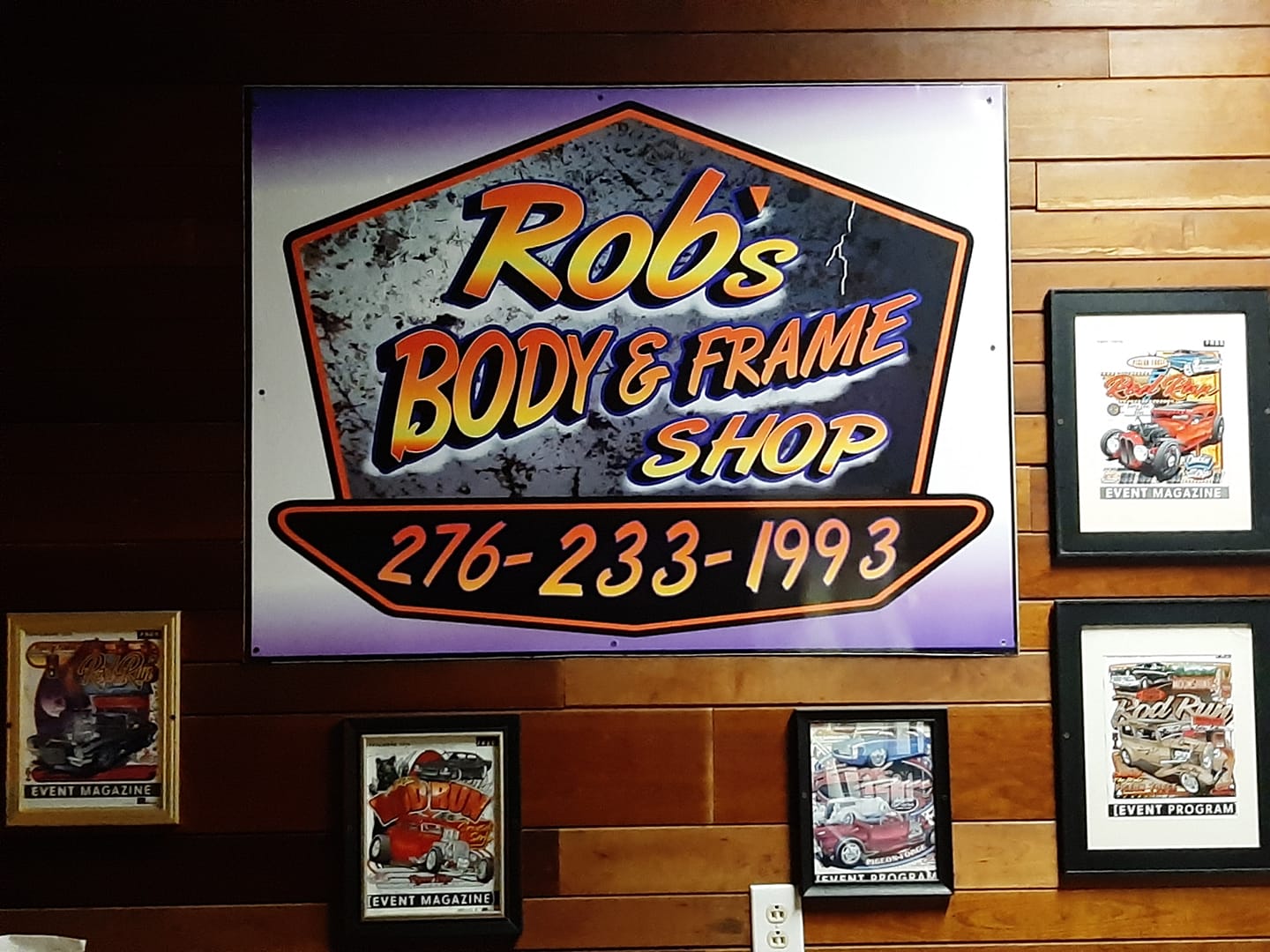 Hand-painted Rob's Body and Frame Shop sign with phone number 276-233-1993